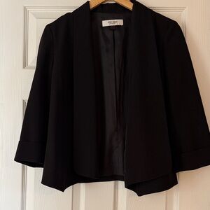 Cute Black Blazer. Slightly cropped fit.